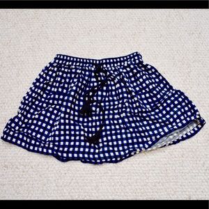 Mini blue and black square pattern skirt.
